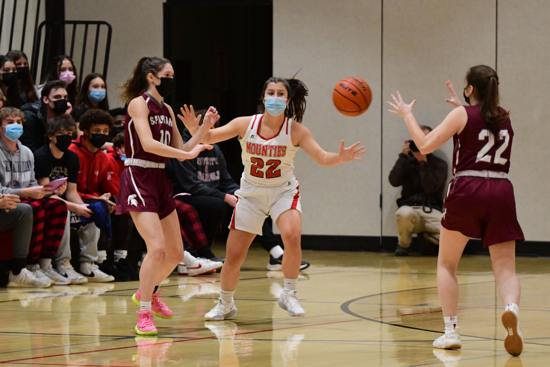 Girls play basketball